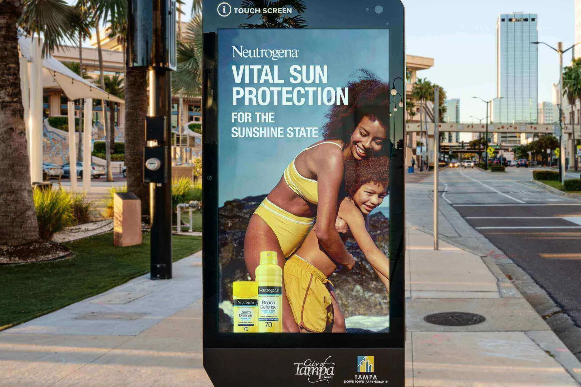 Neutrogena Vital Sun Protection campaign on a Tampa DOOH screen